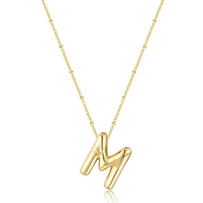 The letter pendant is available in 26 colors in 18K
