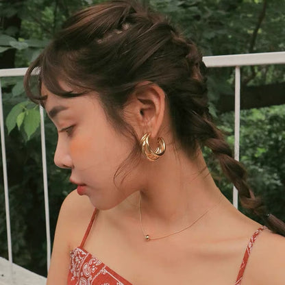 The 925 Silver Needle three-ring circular earrings are stylish and trendy ear ring accessories