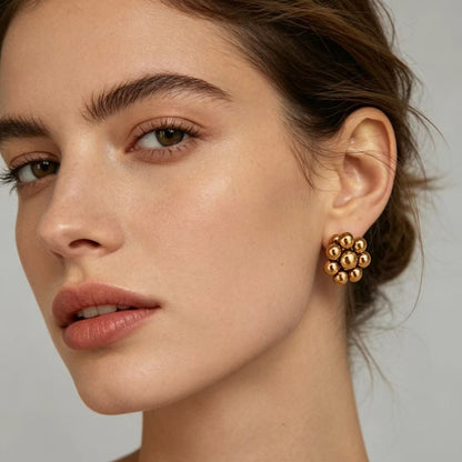 Selected black and white oil-dripping irregular square ear studs with a all design and tassel for women