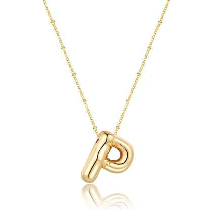 The letter pendant is available in 26 colors in 18K