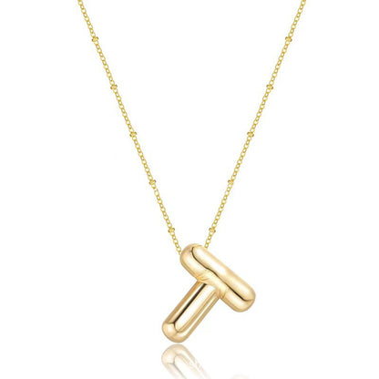 The letter pendant is available in 26 colors in 18K