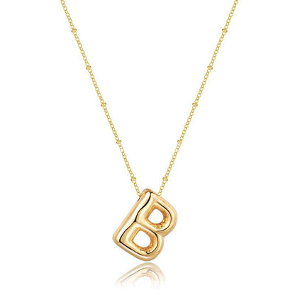 The letter pendant is available in 26 colors in 18K