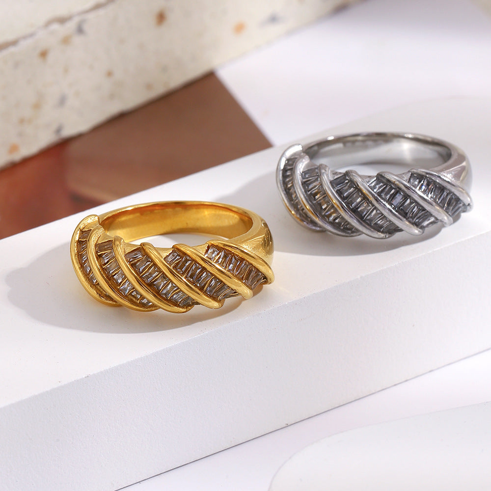 This high-end and elegant jewelry is plated with an 18K rectangular twisted interface ring