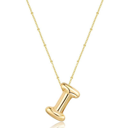 The letter pendant is available in 26 colors in 18K