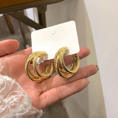 The 925 Silver Needle three-ring circular earrings are stylish and trendy ear ring accessories