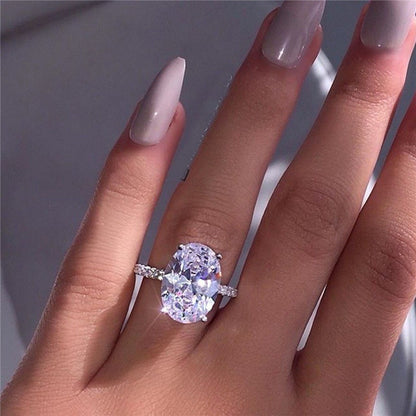 Three Heroes Large oval white-plated ring decoration ring