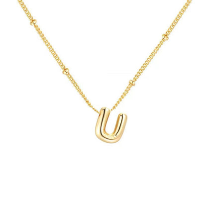 The letter pendant is available in 26 colors in 18K