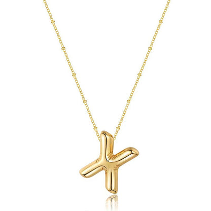 The letter pendant is available in 26 colors in 18K