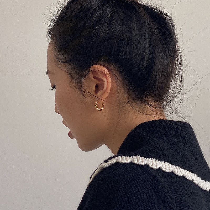 Twisted ring earrings, trendy twisted twist ear rings, design sense, all stud earrings, women's earrings