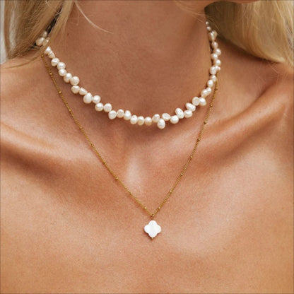 Side-mounted beaded flower women's high-end design, versatile four-petal flower necklace shell
