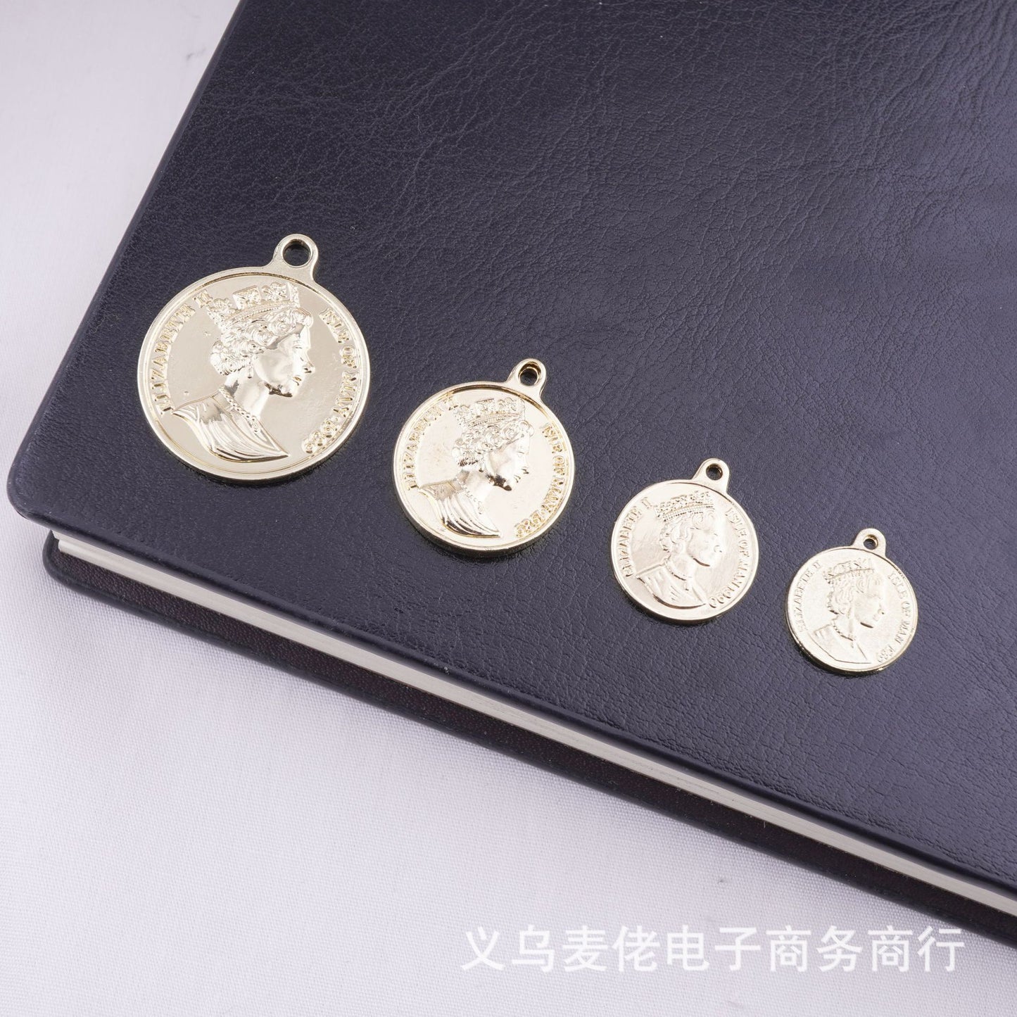 A coin pendant with a beautiful human head