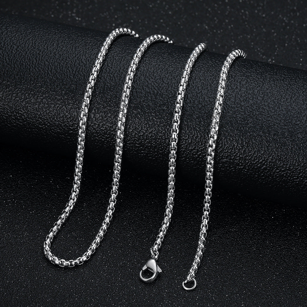 A popular  hip-hop accessory from Europe and America, a titanium steel gold-plated and diamond-encrusted YS cross pendant necklace