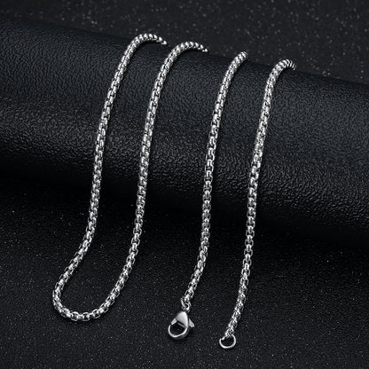 A popular  hip-hop accessory from Europe and America, a titanium steel gold-plated and diamond-encrusted YS cross pendant necklace