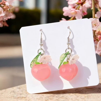 The earrings are designed with a sense of blueberry pendant ear hooks and sweet peach pendant earrings