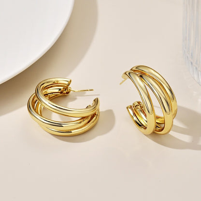 This multi-layered C-shaped earrings exude a sense of high-end sophistication and are versatile in style
