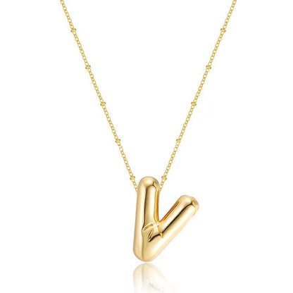 The letter pendant is available in 26 colors in 18K