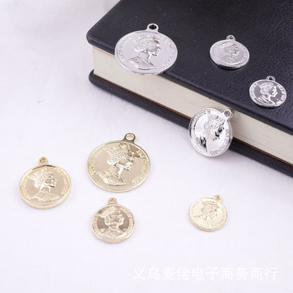 A coin pendant with a beautiful human head