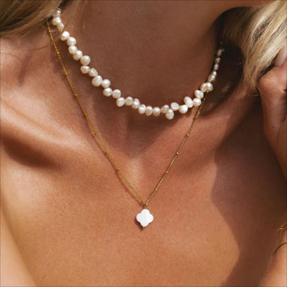 Side-mounted beaded flower women's high-end design, versatile four-petal flower necklace shell